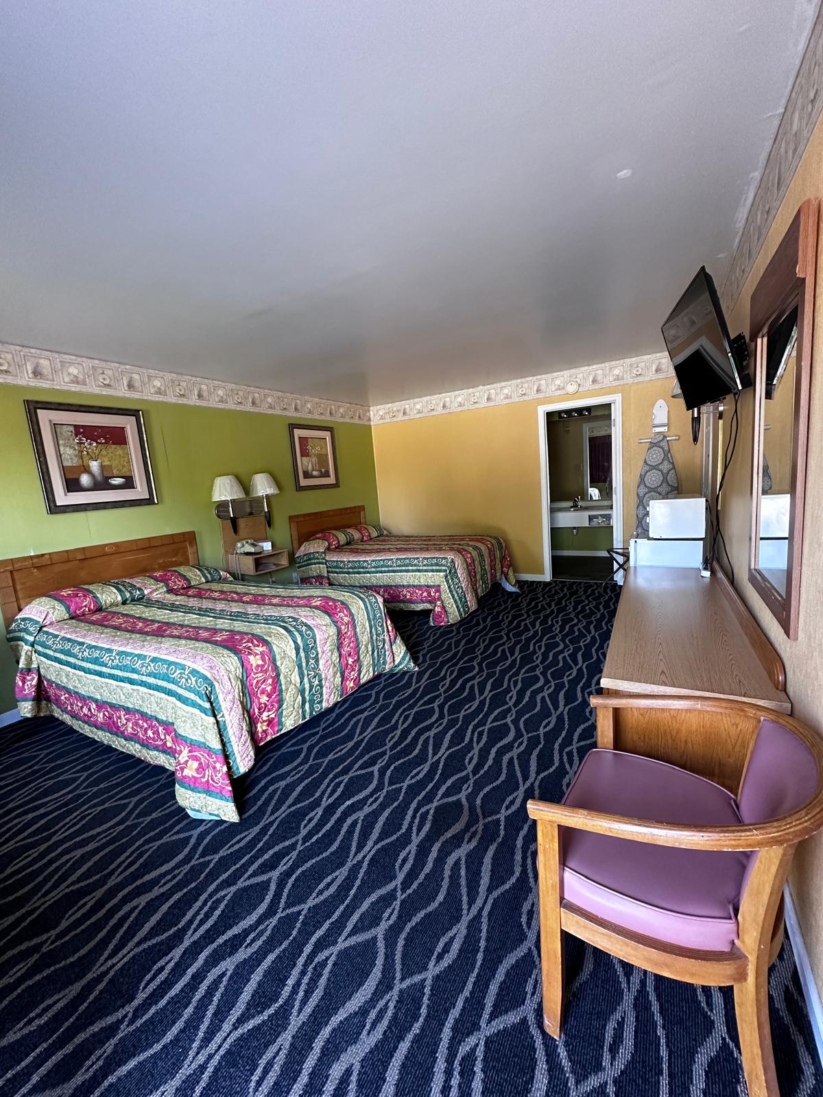 Cozy seating area with lamp and artwork